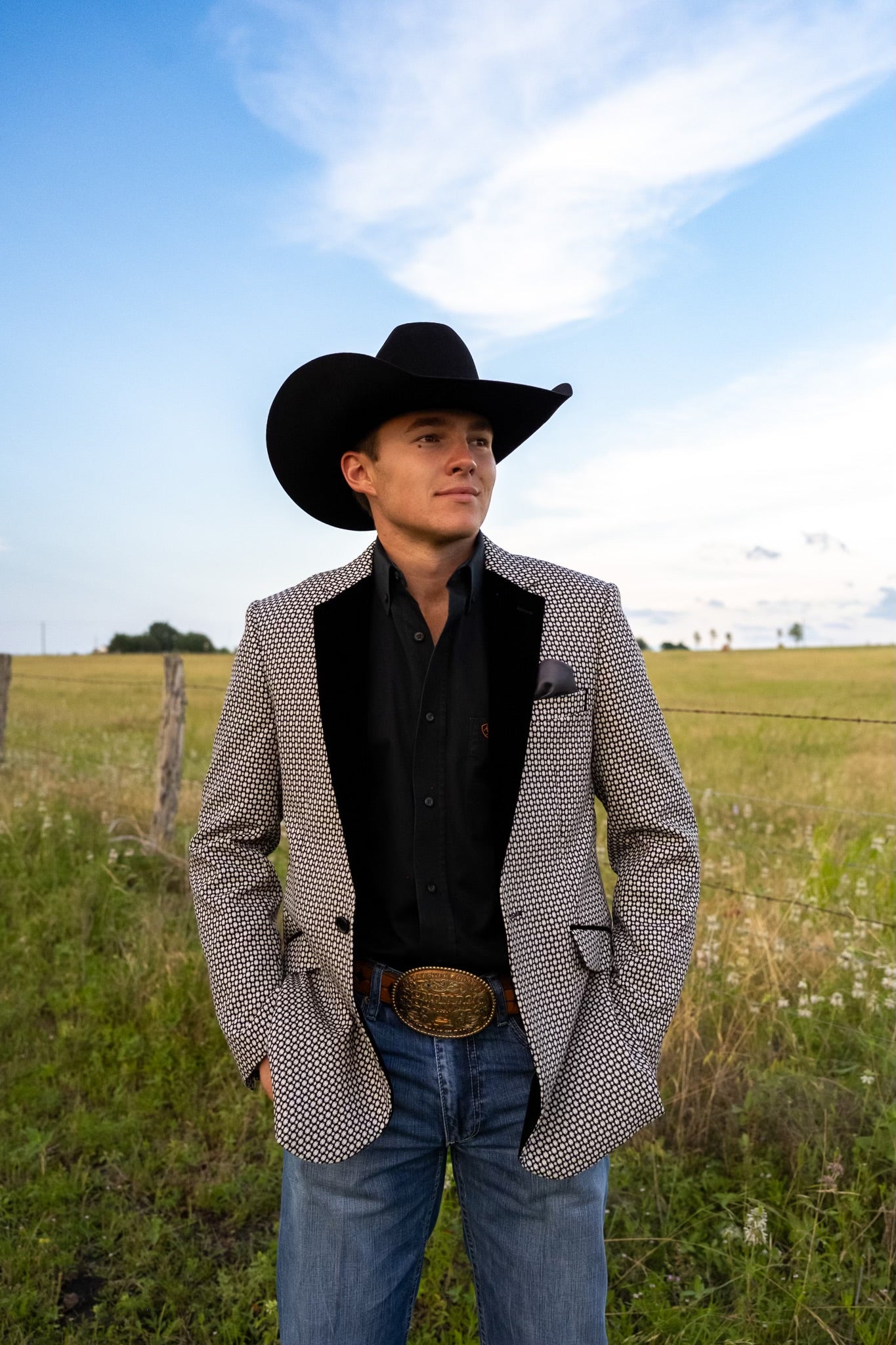 Western gentleman wearing Black and White Cowboy Sport Coat at formal ranch wedding reception