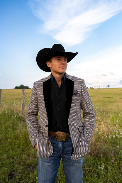 Western gentleman wearing Black and White Cowboy Sport Coat at formal ranch wedding reception