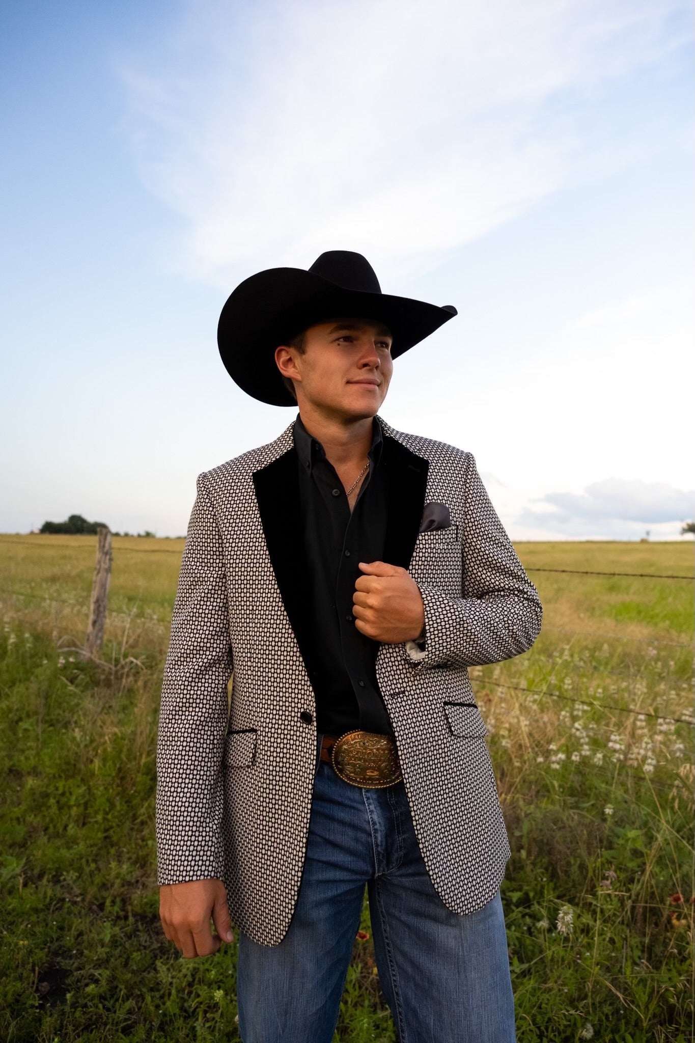 Black and White Cowboy Sport Coat styled with denim jeans and boots for Western formal look