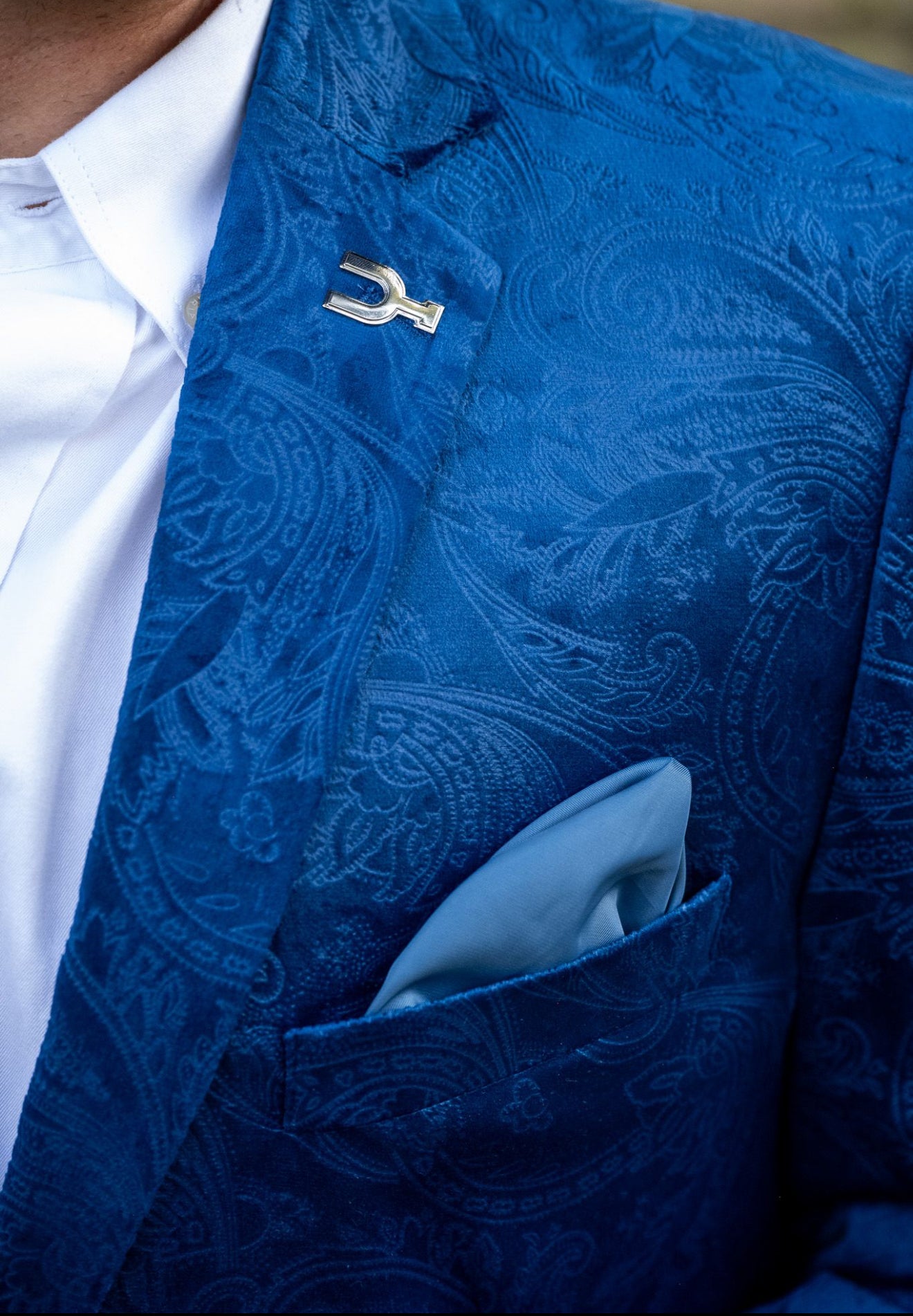 Classic Fit royal blue western jacket with paisley design and magnetic Espuela lapel pin.